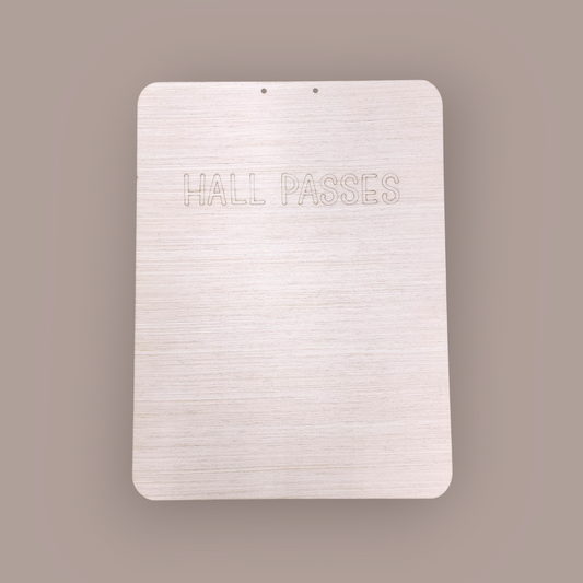 A DIY wooden hall pass door hanger kit showing the shiplap backer board and four separate, engraved passes before assembly.
