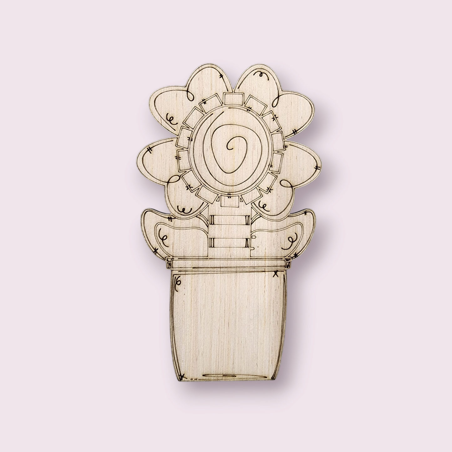 Unfinished wood door hanger blank with an engraved design of a funky, stylized flower in a pot.