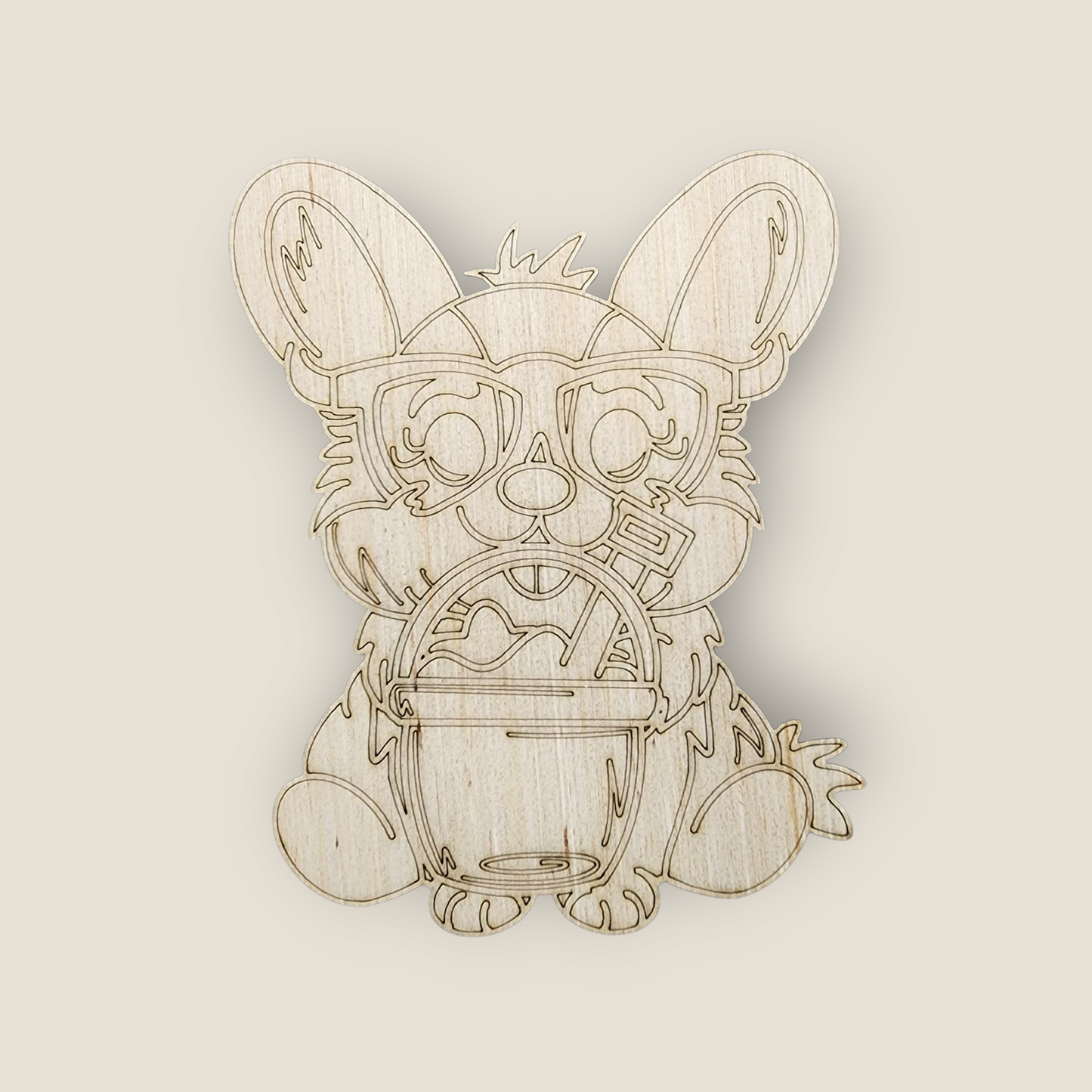Unfinished wood door hanger blank with an engraved design of a Corgi wearing sunglasses and holding a beach bucket.