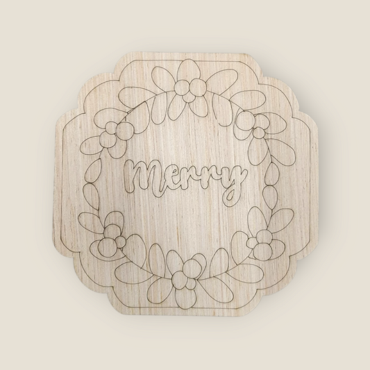 Unfinished scalloped square wood blank with an engraved floral wreath and the word "Merry".