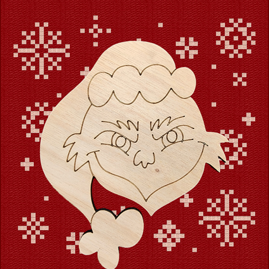 Unfinished wood cutout of a grumpy green Christmas character with a mischievous grin.